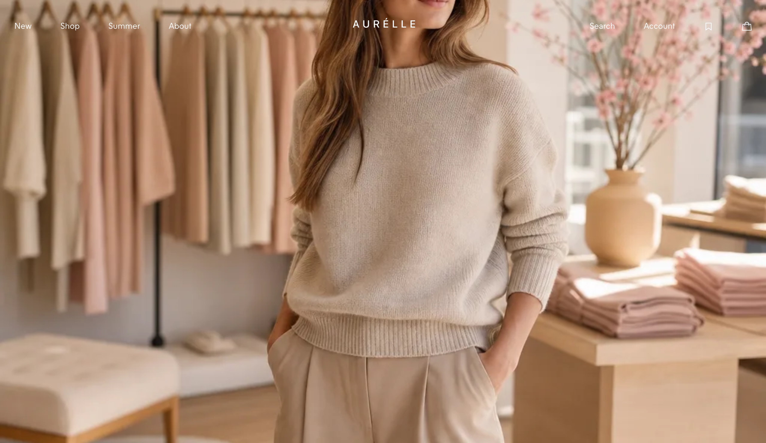 vibemyshop 生成的 AURÉLLE 女装店:极简导航、品牌字标与女装编辑式主视觉